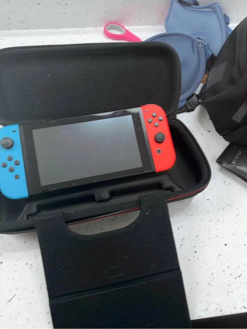 Nintendo Switch with Neon Red & Neon Blue Joy-Con and Accessories